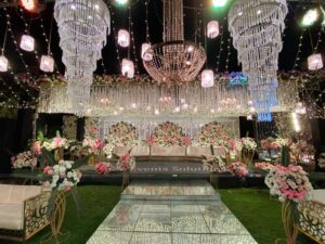 outdoor setup, hanging chandeliers, stages designers