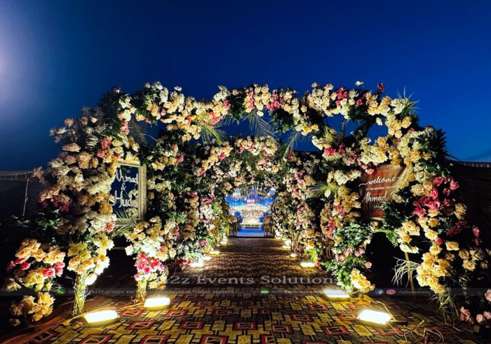 grand floral entrance, tunnel entrance, wedding designers, decor experts