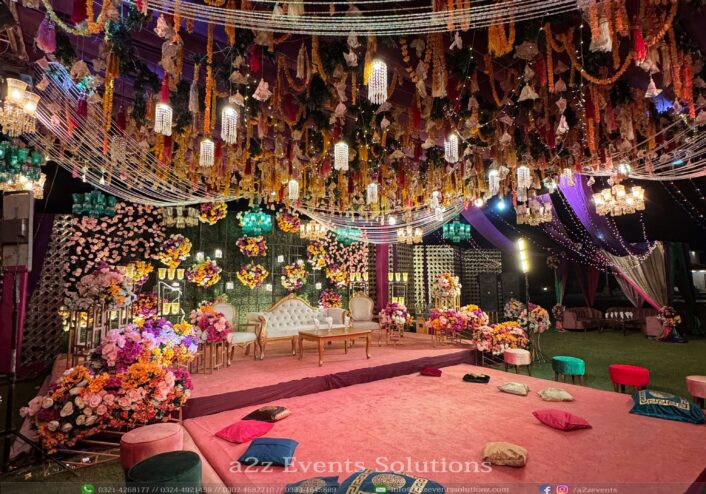 open air wedding, colorful mehndi decor, wedding caterers, wedding management