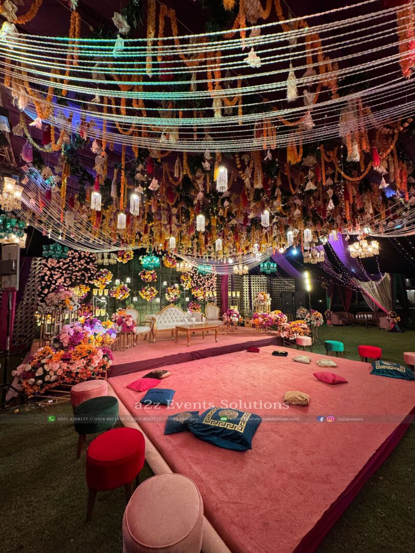 open air wedding, colorful mehndi decor, wedding caterers, wedding management