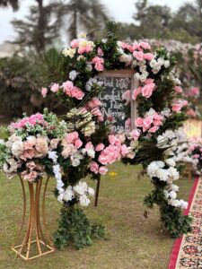 welcome board, event decorators, floral decor, wedding setup
