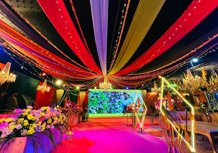 multicolored setup, multimedia, lighting, wedding entrance decor