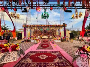 day time event, stage decor, floral backdrop, mehndi event