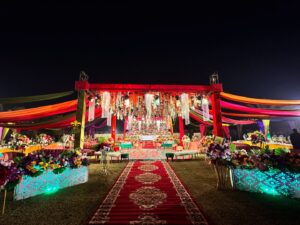 outdoor-wedding-setup grand wedding setup, multicolored decor, mehndi event setup, caterers