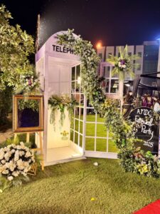 photobooth-setup event decorators, corporate event setup, photo booth corner, floral decor