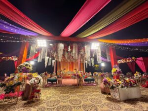 intimate-mehndi-setup intimate wedding, multicolored decor, draping, catering setup