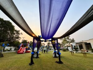 open-air-birthday-party boss baby theme, balloon decor, catering setup, events designers