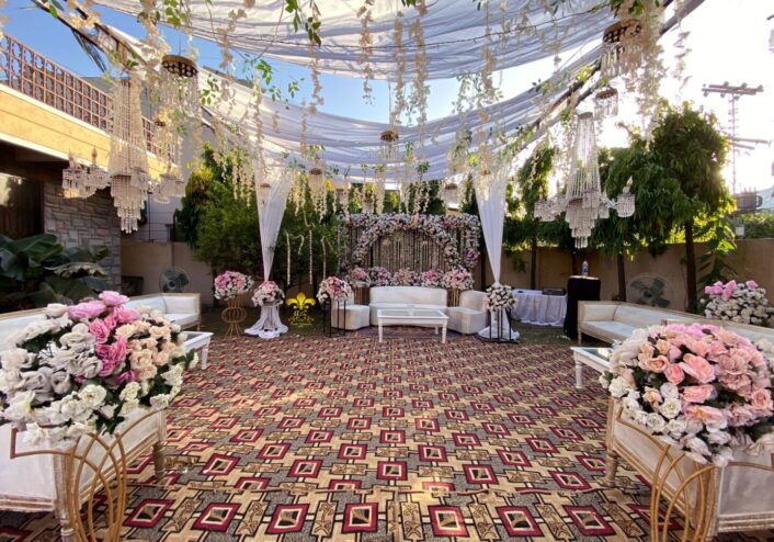 floral backdrop, seating arrangement, wedding caterers, events services