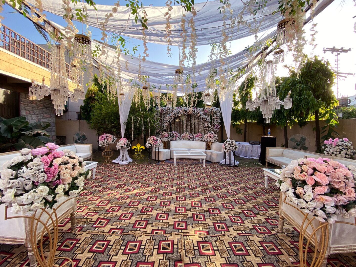 floral backdrop, seating arrangement, wedding caterers, events services