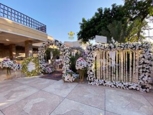 entrance-decor selfie booth, photo corner, home lawn setup, intimate ceremony