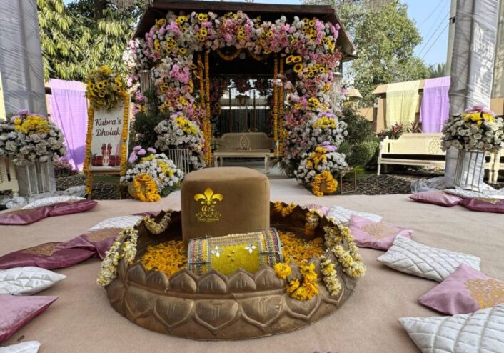 dholak stage, dance floor, floral decor, ubtan theme