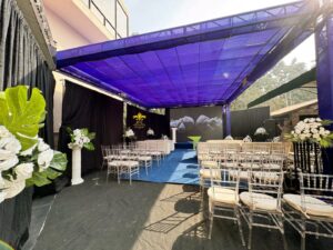 open-air-corporate-event outdoor decor, hi tea, wall paneling, sitting arrangements