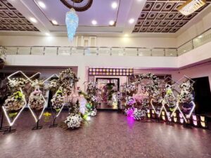 thematic-entrance floral decor, wedding designers, indoor setup, wedding ceremony