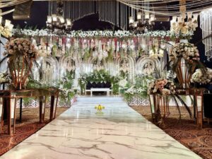 crystal-beaded-decor console tables, marble walkway, area decor, hanging chandeliers