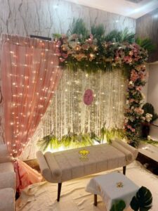 backdrop, engagement setup, floral decor, indoor setup