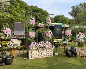 photo-booth floral decor, selfie corner, events management, daytime event