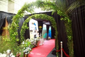 red-carpet-entrance western theme, wall paneling, arches, company event