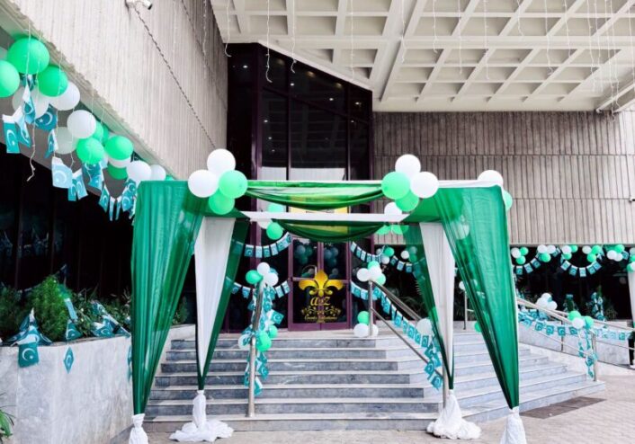 entrance setup, corporate event, balloon decor, flags installations