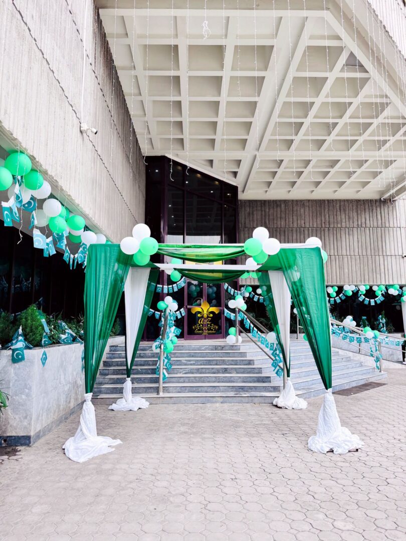 entrance setup, corporate event, balloon decor, flags installations