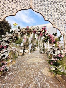 floral arches, wedding entrance, daytime wedding, walima ceremony