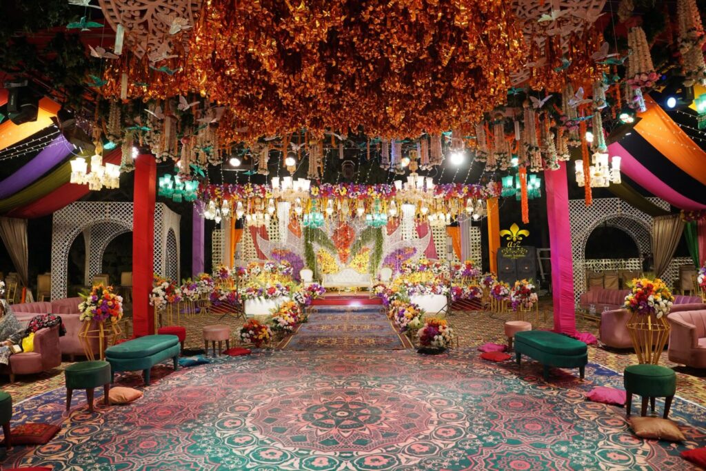 grand-wedding-setup dance floor, grand stage, floral hanging, events planners