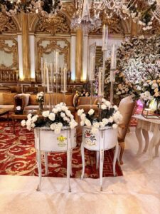 wedding-designers table decor, candle stand, floral setup, crystal vases