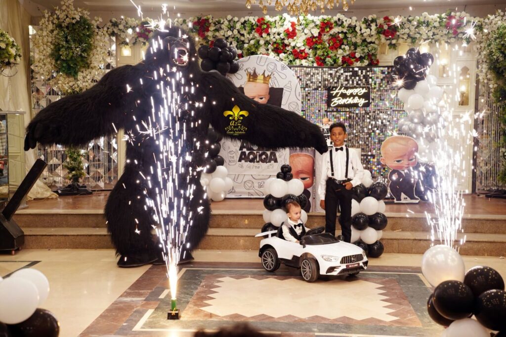 birthday-bash gorilla entry, cold fire, caterers, themed decor