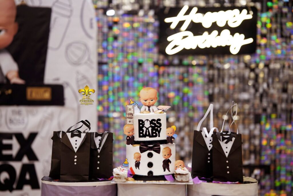 boss-baby-birthday-party-planners grand birthday setup, neon signage, thematic backdrop, indoor event