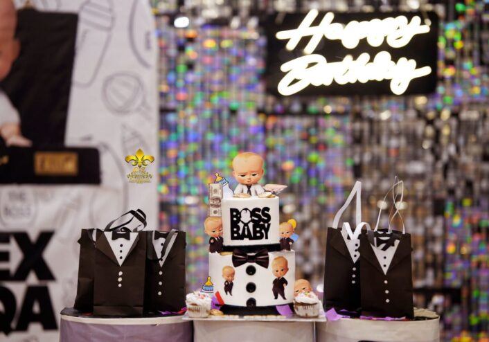 grand birthday setup, neon signage, thematic backdrop, indoor event