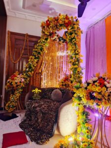 floral-backdrop mayoun stage, intimate event, catering company, wedding decorators