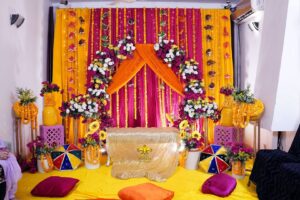 intimate-mayoun-stage home based ceremony, wedding management, dholak setup, floral backdrop